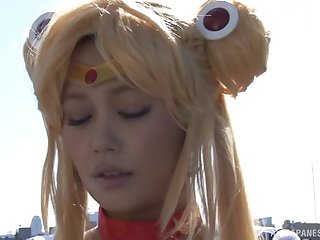 Japanese cosplay babes get on their knees and suck dick